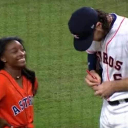 simone biles throws first pitch