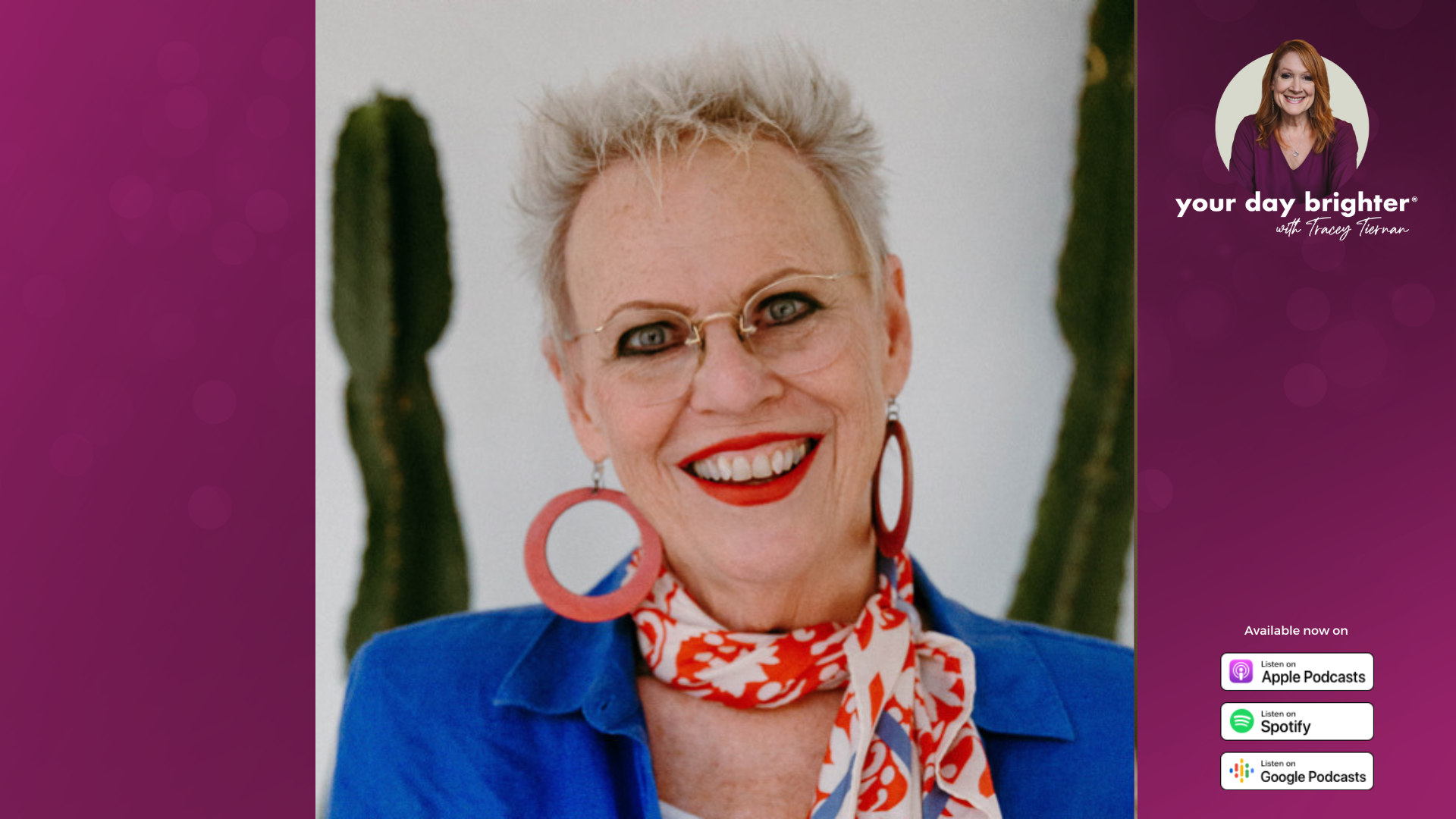 Kathy Gilbert smiling and wearing a royal blue shirt with a orange and white neck scarf and orange circle earrings